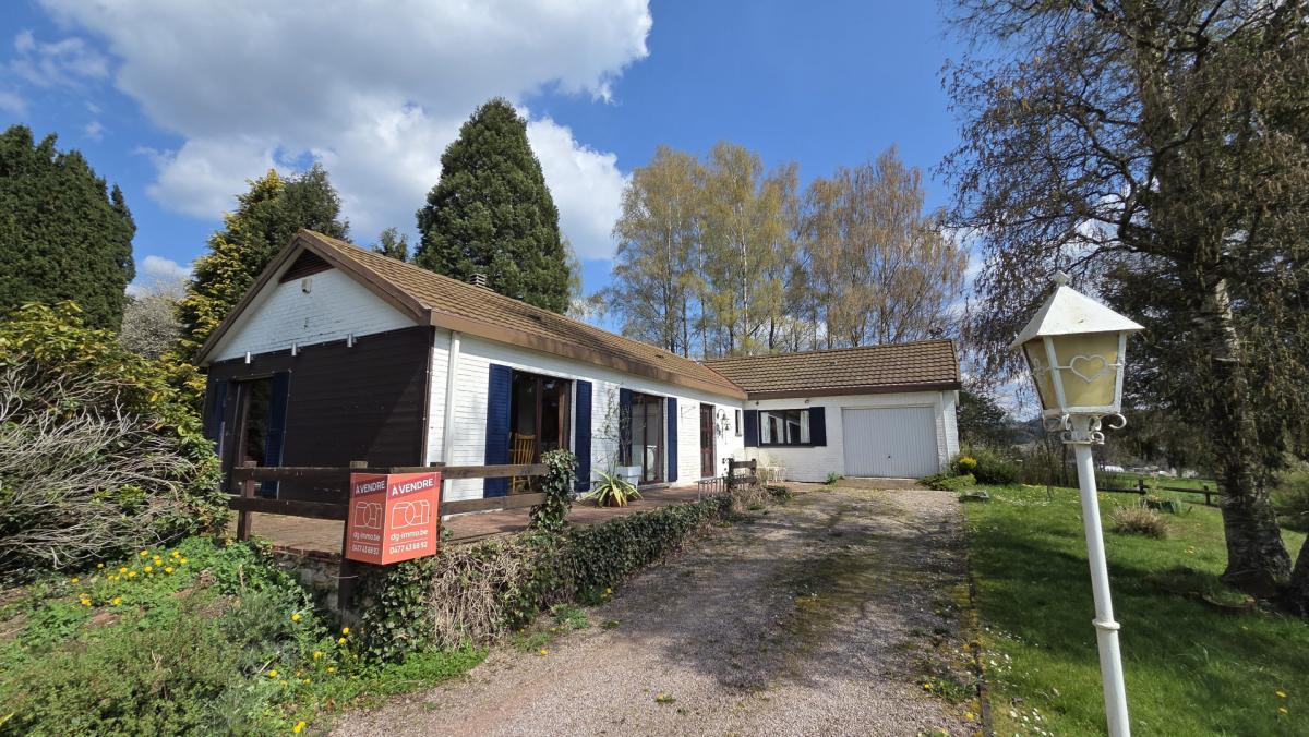 Maison 4 façades de plain-pied avec jardin arboré